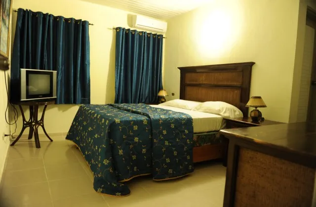 Hotel Taino Frontera Jimani room bed king size